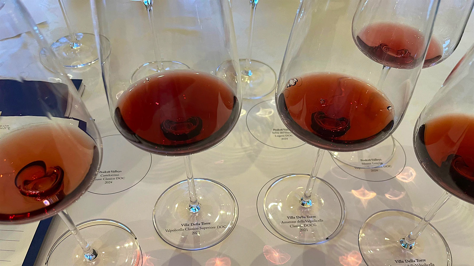 Glasses of Villa Della Torre wines, with Valpolicella Superiore on the left and Amarone on the right
